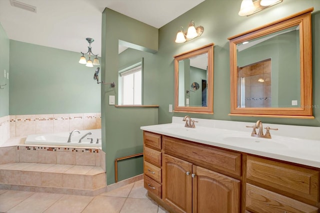15108 Springview St, Tampa, FL 33624 - full bathroom with a bath, double vanity, and tile patterned flooring