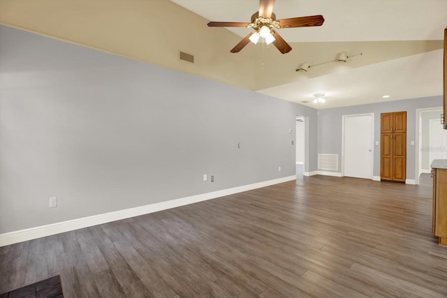 15108 Springview St, Tampa, FL 33624 - unfurnished room featuring lofted ceiling, wood finished floors, ceiling fan, and baseboards