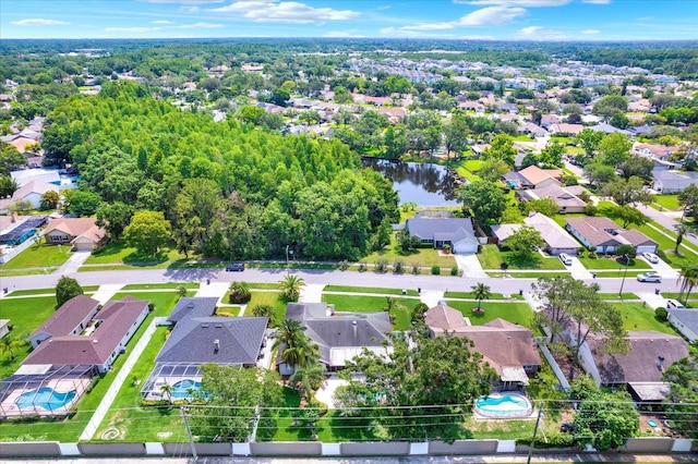 15108 Springview St, Tampa, FL 33624 - aerial view of residential area with a pool and a nearby body of water