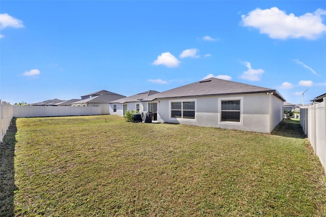 16632 Sunburst Lake St, Wimauma, FL 33598 - rear view of property with stucco siding