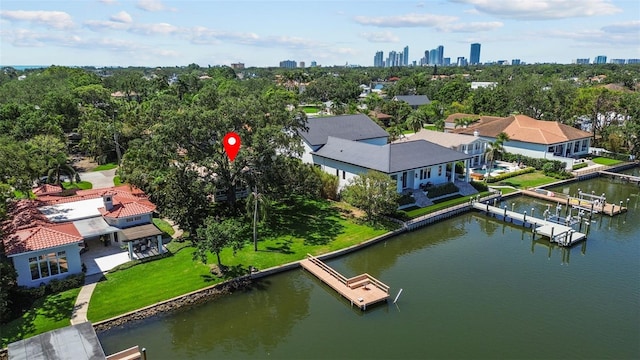 1238 Monterey Blvd NE, Saint Petersburg, FL 33704 - aerial view of a nearby body of water, a tree filled landscape, and city skyline