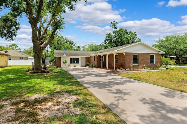 509 Falmouth St, Temple Terrace, FL 33617 - ranch-style house featuring driveway and brick siding