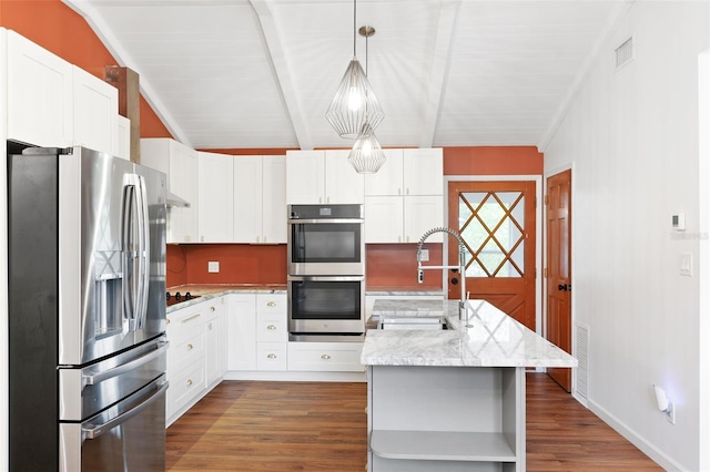 509 Falmouth St, Temple Terrace, FL 33617 - kitchen featuring appliances with stainless steel finishes, open shelves, a sink, wood finished floors, and white cabinets