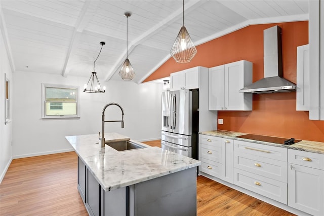 509 Falmouth St, Temple Terrace, FL 33617 - kitchen featuring wall chimney exhaust hood, stainless steel fridge with ice dispenser, a sink, black electric stovetop, and an island with sink