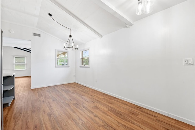 509 Falmouth St, Temple Terrace, FL 33617 - unfurnished dining area with a chandelier, wood finished floors, plenty of natural light, and baseboards