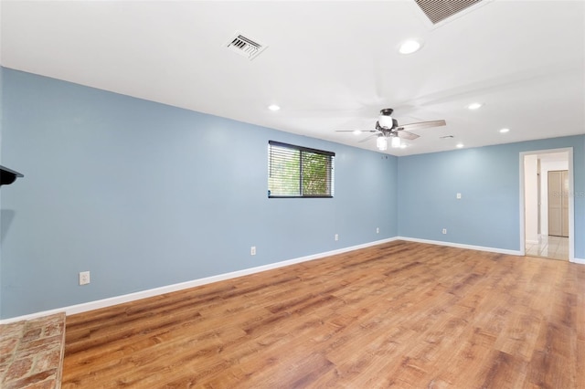 509 Falmouth St, Temple Terrace, FL 33617 - unfurnished room featuring recessed lighting, light wood-style floors, baseboards, and a ceiling fan