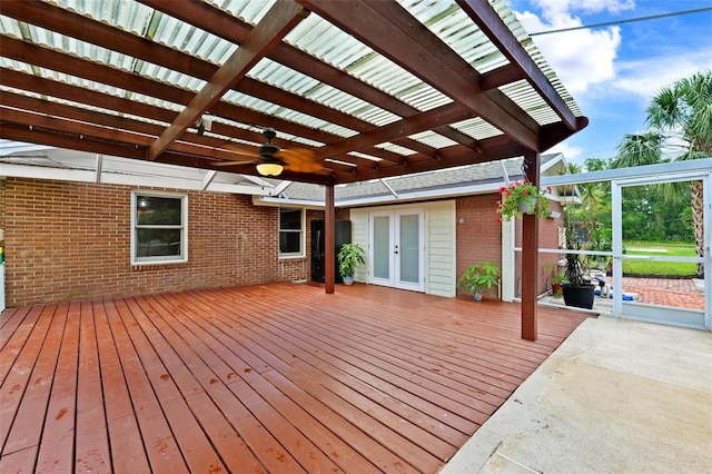 509 Falmouth St, Temple Terrace, FL 33617 - wooden deck with a pergola, ceiling fan, and french doors