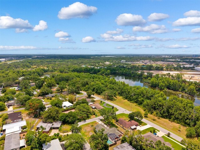 509 Falmouth St, Temple Terrace, FL 33617 - aerial perspective of suburban area with a large body of water and a forest