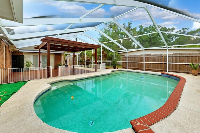 509 Falmouth St, Temple Terrace, FL 33617 - view of swimming pool with a fenced backyard, a patio, and a lanai
