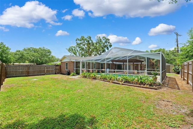 509 Falmouth St, Temple Terrace, FL 33617 - back of property featuring a lanai