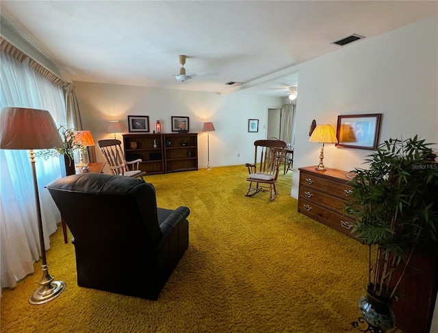 2195 Academy Dr, Clearwater, FL 33764 - living room with carpet flooring and a ceiling fan