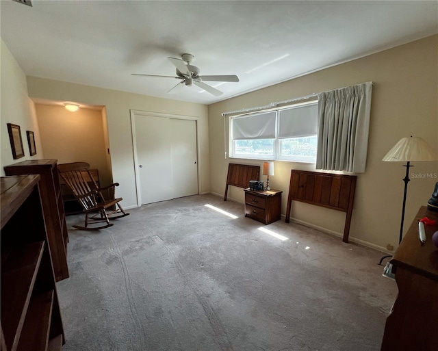 2195 Academy Dr, Clearwater, FL 33764 - living area featuring a ceiling fan, carpet floors, and baseboards