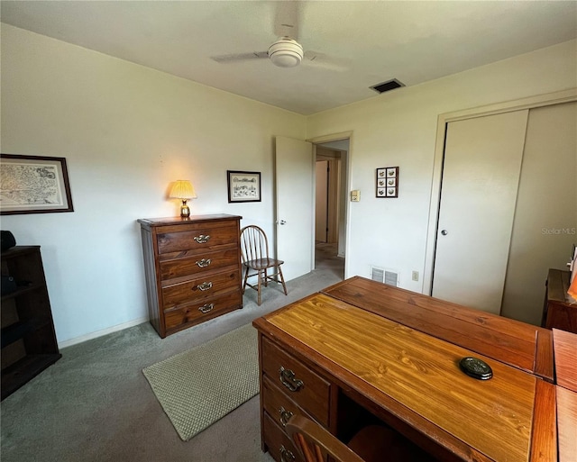 2195 Academy Dr, Clearwater, FL 33764 - bedroom featuring carpet floors, a closet, and a ceiling fan