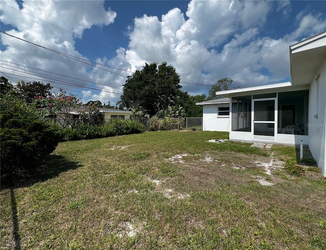 2195 Academy Dr, Clearwater, FL 33764 - view of yard with a sunroom