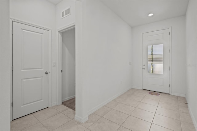 12697 Achasta Blvd, Hudson, FL 34669 - foyer entrance featuring light tile patterned floors and baseboards