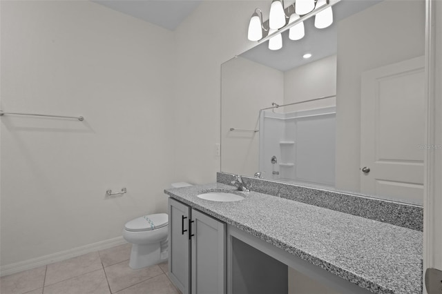 12697 Achasta Blvd, Hudson, FL 34669 - full bath featuring vanity, toilet, tile patterned flooring, baseboards, and a shower