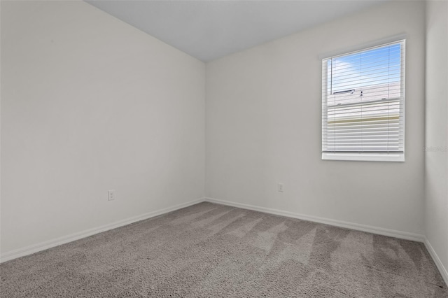 12697 Achasta Blvd, Hudson, FL 34669 - carpeted spare room featuring baseboards
