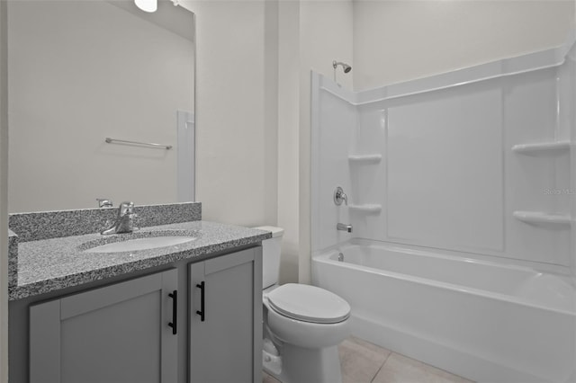 12697 Achasta Blvd, Hudson, FL 34669 - full bath featuring toilet, tile patterned flooring, vanity, and bathing tub / shower combination