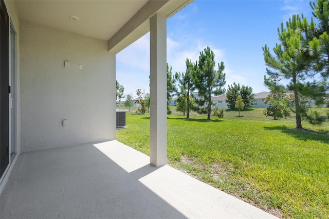 12697 Achasta Blvd, Hudson, FL 34669 - view of patio featuring central AC