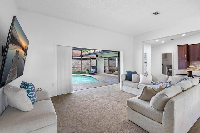 12470 93rd St, Largo, FL 33773 - living room with carpet and recessed lighting
