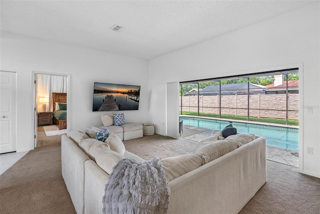 12470 93rd St, Largo, FL 33773 - living area with carpet