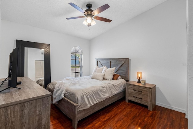 12470 93rd St, Largo, FL 33773 - bedroom featuring dark wood-style floors, baseboards, lofted ceiling, and ceiling fan