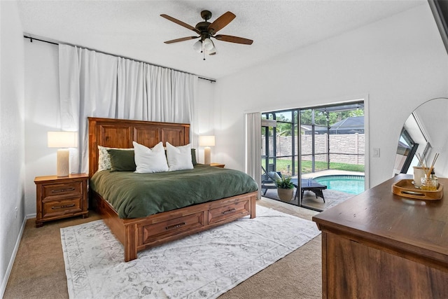 12470 93rd St, Largo, FL 33773 - carpeted bedroom featuring access to exterior, baseboards, and a ceiling fan
