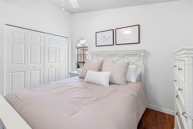 12470 93rd St, Largo, FL 33773 - bedroom featuring wood finished floors, a closet, baseboards, and ceiling fan