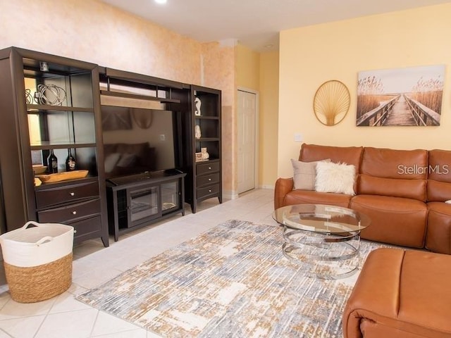 101 8th St, Belleair Beach, FL 33786 - living area with tile patterned floors and baseboards