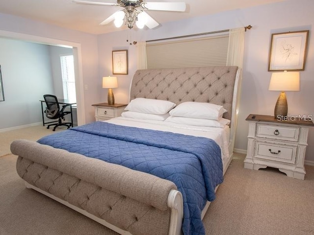101 8th St, Belleair Beach, FL 33786 - bedroom with carpet flooring, ceiling fan, and baseboards