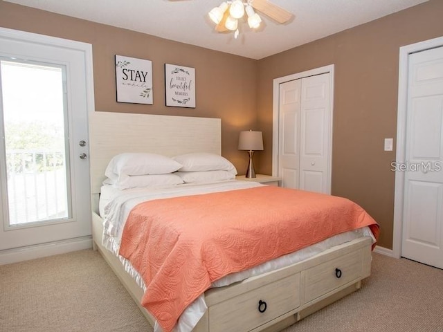 101 8th St, Belleair Beach, FL 33786 - carpeted bedroom featuring a ceiling fan, a closet, and baseboards