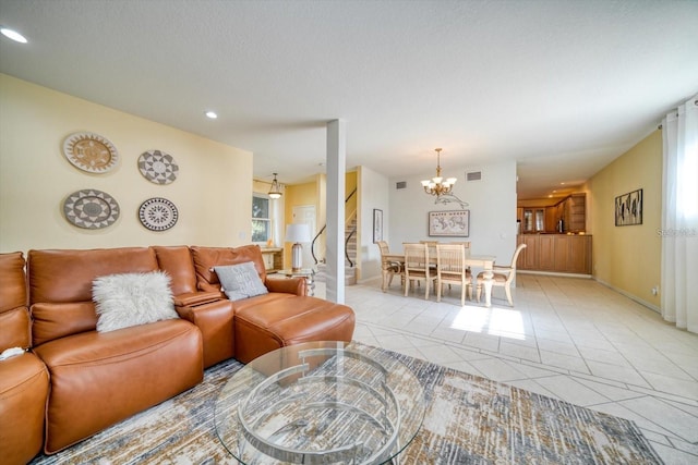101 8th St, Belleair Beach, FL 33786 - living area with a chandelier, recessed lighting, light tile patterned floors, and baseboards