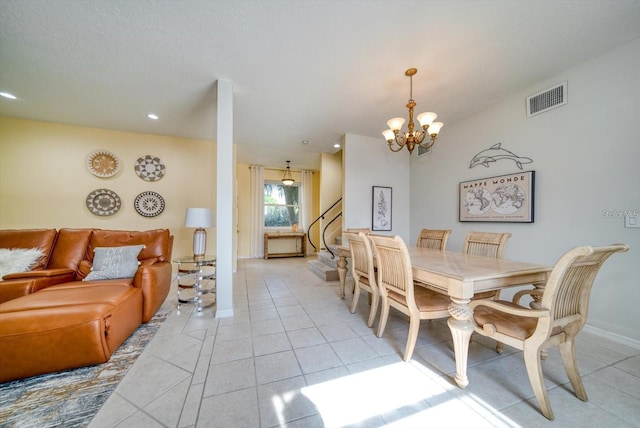 101 8th St, Belleair Beach, FL 33786 - dining area featuring a chandelier, light tile patterned floors, baseboards, and recessed lighting