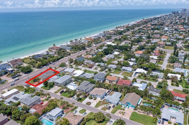 101 8th St, Belleair Beach, FL 33786 - aerial view of property and surrounding area with a large body of water, property parcel outlined, and nearby suburban area