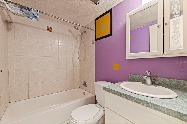 1799 N Highland Ave Unit 3, Clearwater, FL 33755 - bathroom with a textured ceiling, toilet, bathtub / shower combination, vanity, and a textured wall