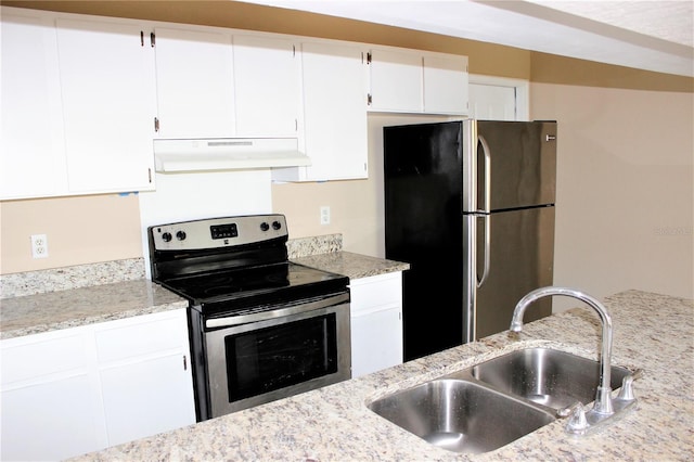 13235 Sanctuary Cove Dr Unit 201, Temple Terrace, FL 33637 - kitchen featuring ventilation hood, stainless steel appliances, white cabinetry, and light stone countertops