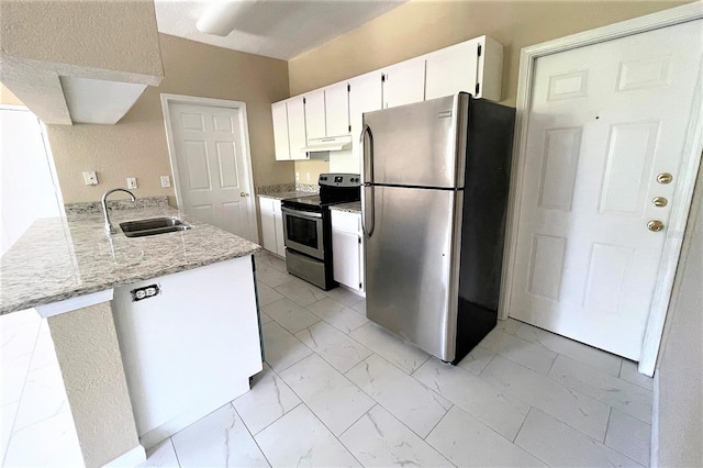 13235 Sanctuary Cove Dr Unit 201, Temple Terrace, FL 33637 - kitchen featuring stainless steel appliances, under cabinet range hood, light marble finish floors, a peninsula, and white cabinetry