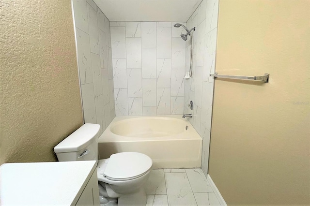 13235 Sanctuary Cove Dr Unit 201, Temple Terrace, FL 33637 - bathroom featuring vanity, marble finish floors, tub / shower combination, and a textured wall