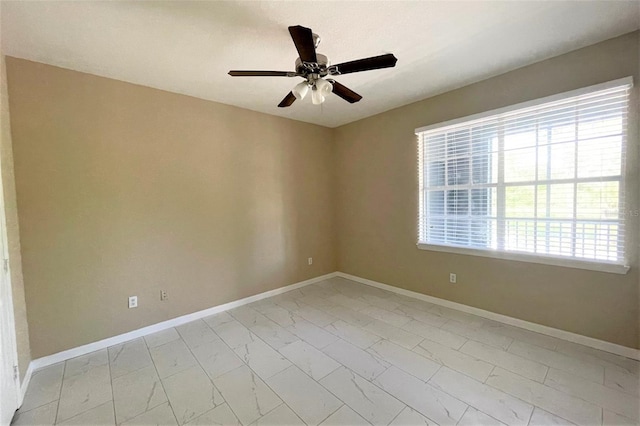 13235 Sanctuary Cove Dr Unit 201, Temple Terrace, FL 33637 - unfurnished room with light marble finish floors and ceiling fan