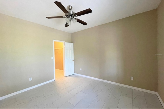 13235 Sanctuary Cove Dr Unit 201, Temple Terrace, FL 33637 - empty room featuring marble finish floors and ceiling fan