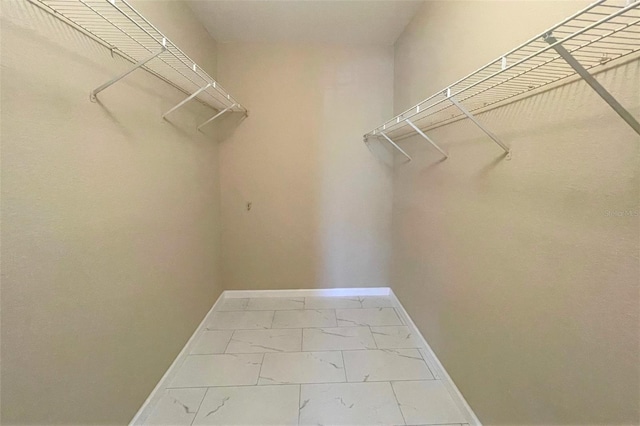13235 Sanctuary Cove Dr Unit 201, Temple Terrace, FL 33637 - spacious closet featuring marble look tiles
