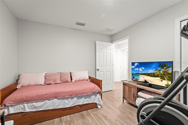 8009 N Primrose Dr, Citrus Springs, FL 34434 - bedroom featuring light wood-style flooring