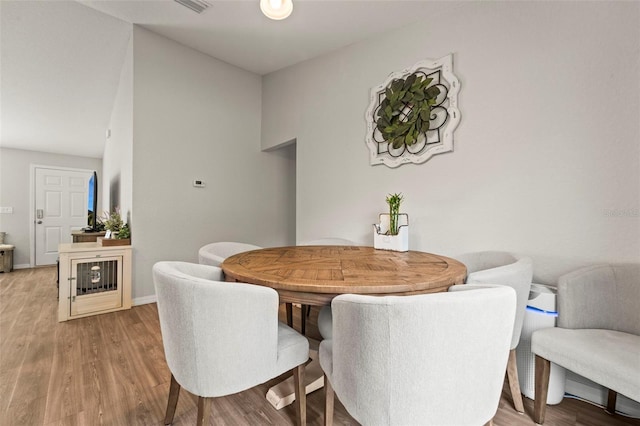 8009 N Primrose Dr, Citrus Springs, FL 34434 - dining room with light wood-type flooring and baseboards