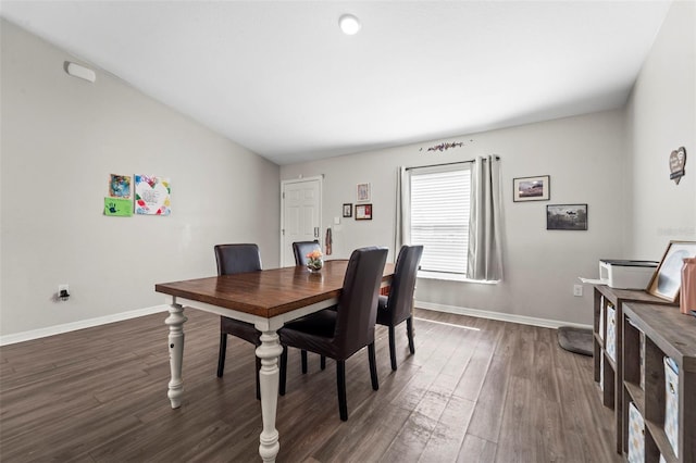 7839 N Quibble Ave, Citrus Springs, FL 34434 - dining room with dark wood-type flooring and baseboards