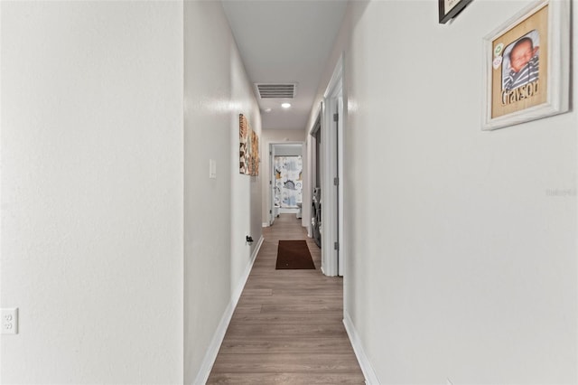 7839 N Quibble Ave, Citrus Springs, FL 34434 - corridor with baseboards, wood finished floors, and recessed lighting