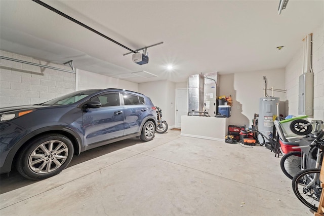 7839 N Quibble Ave, Citrus Springs, FL 34434 - garage with electric water heater, a garage door opener, electric panel, heating unit, and concrete block wall