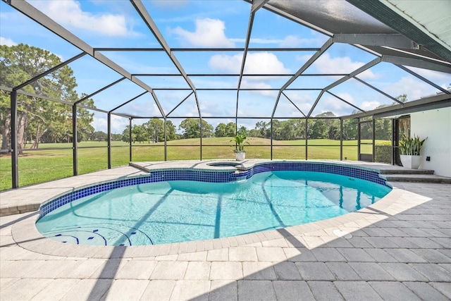 2900 Sandpiper Pl, Clearwater, FL 33762 - view of swimming pool with a lawn, a pool with connected hot tub, and a patio