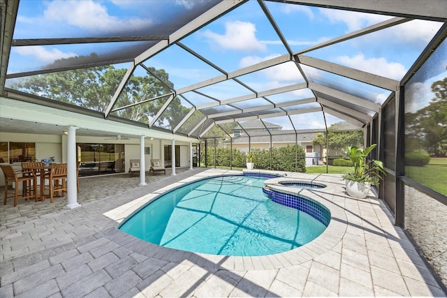 2900 Sandpiper Pl, Clearwater, FL 33762 - view of pool with a patio area, a pool with connected hot tub, and outdoor dining area