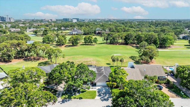 2900 Sandpiper Pl, Clearwater, FL 33762 - drone / aerial view of a golf course and a tree filled landscape
