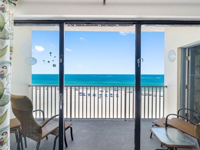 13500 Gulf Blvd Unit 506, Madeira Beach, FL 33708 - balcony featuring view of water and beach